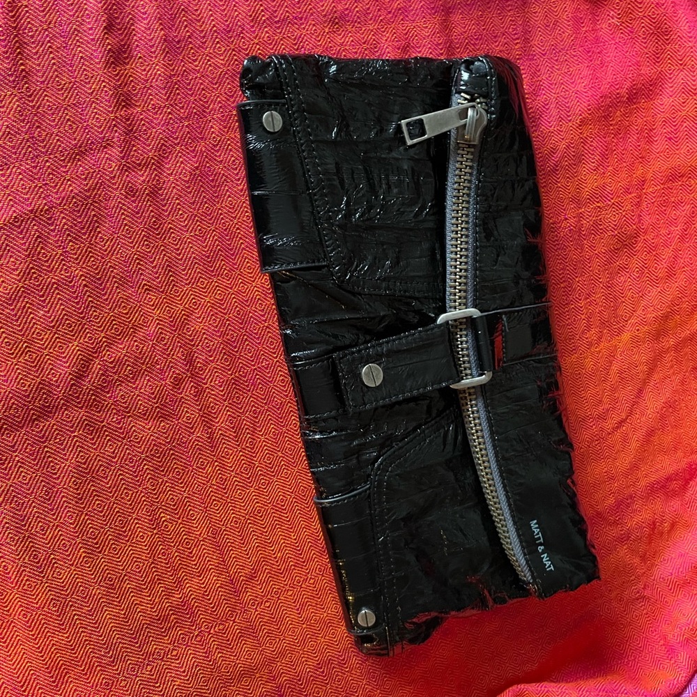 Clutch- gently used- like new.
